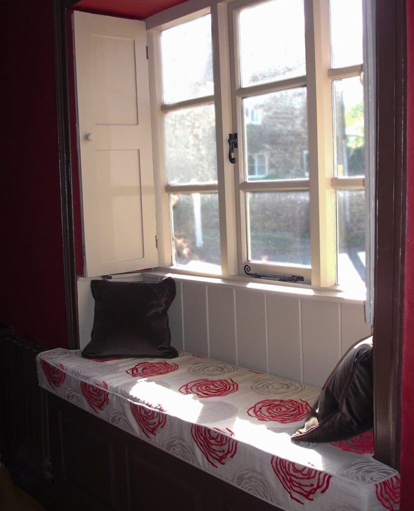 Grade II Listed Converted Old School House-twist interiors window seat in dining room